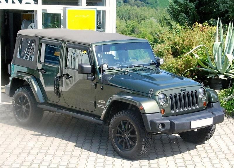 Grün Gebraucht 2008 Jeep Wrangler Unlimited Sahara SUV | 17.990 € (Teuer) - Bild 1/4