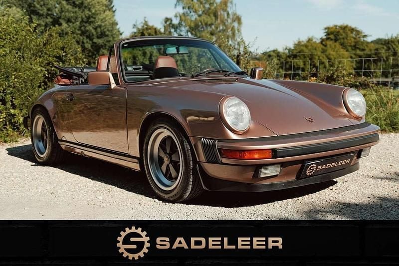 Nougatbraun metallic Gebraucht 1987 Porsche 911 Carrera Cabriolet Cabrio | 99.911 € - Bild 1/4
