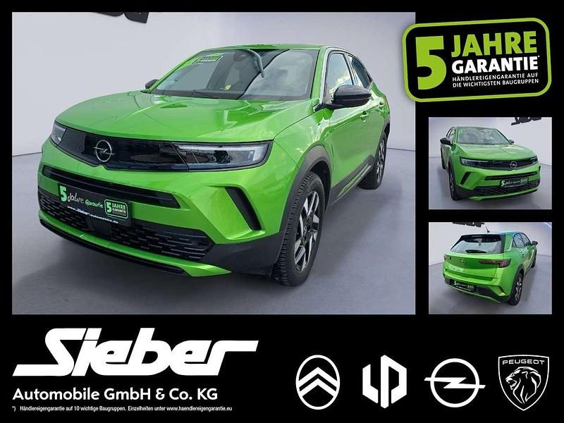 Matcha grün Gebraucht 2023 Opel Mokka-e Elegance SUV | 17.990 € (Superpreis) - Bild 1/4
