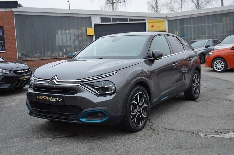 Grau Gebraucht 2021 Citroën e-C4 Shine Limousine | 13.290 € (Guter Preis) - Bild 1/4