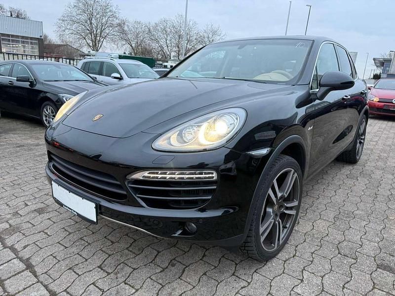 Schwarz (metallic) Gebraucht 2012 Porsche Cayenne SUV | 32.490 € - Bild 1/4