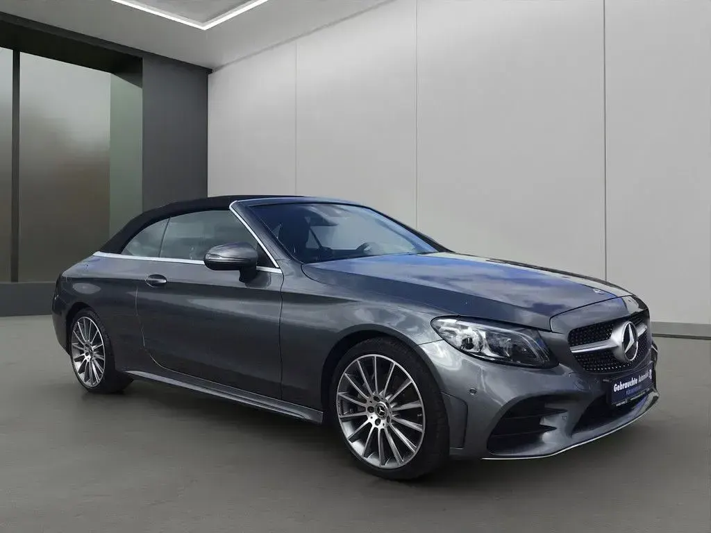 Gebraucht Mercedes C180 AMG 156 PS (114 kW) 2019 Grau / selenitgrau (metallic) Cabrio