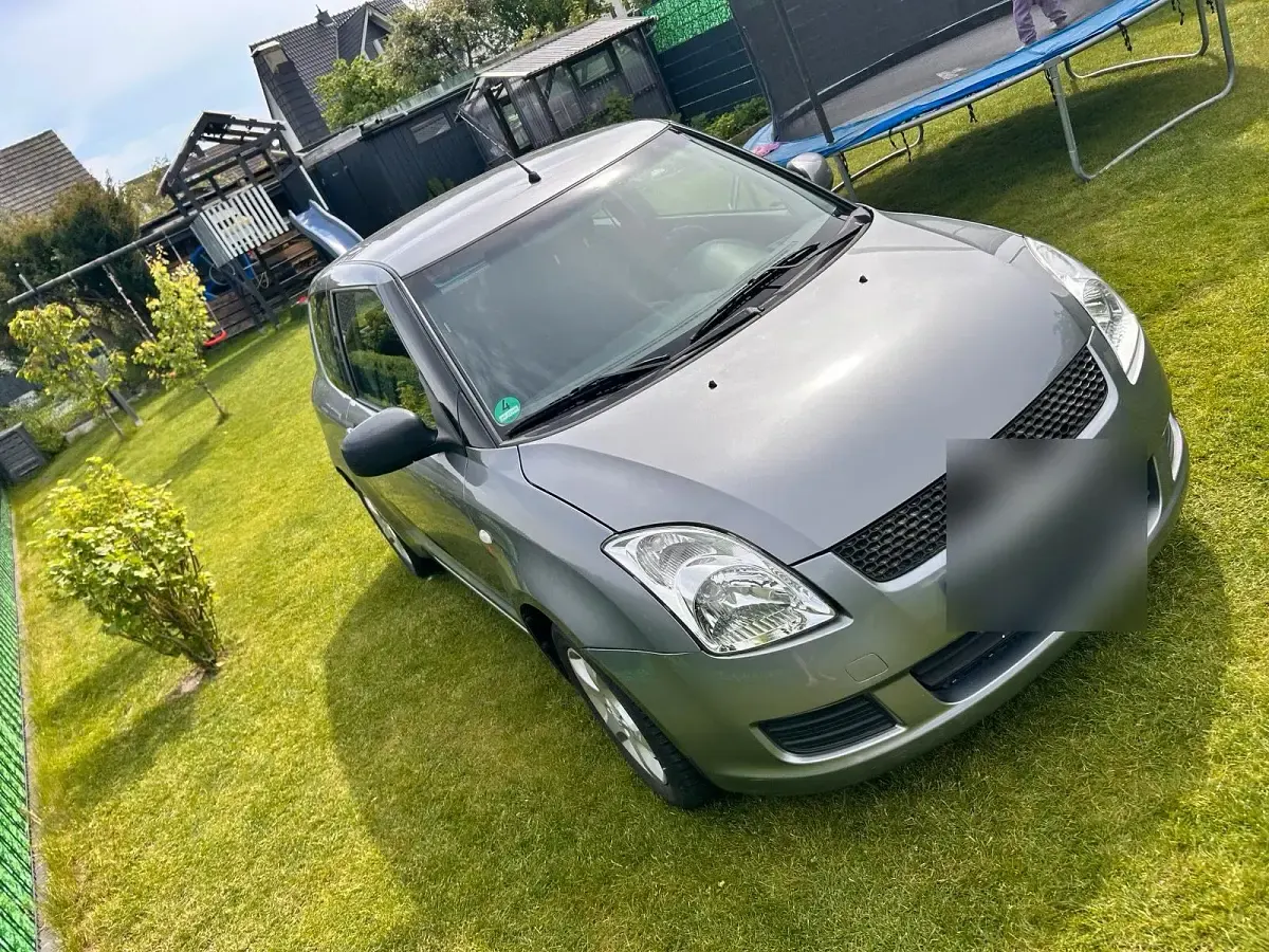 Używany Suzuki Swift 92 KM (67 kW) 2009 Szary Hatchback