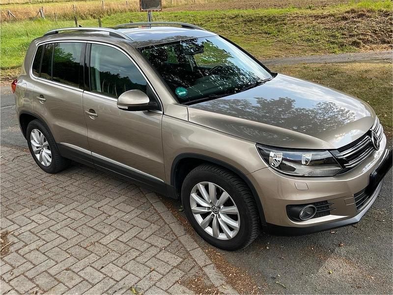 Gold Gebraucht 2012 VW Tiguan Sportline SUV | 11.999 € (Fairer Preis) - Bild 1/4