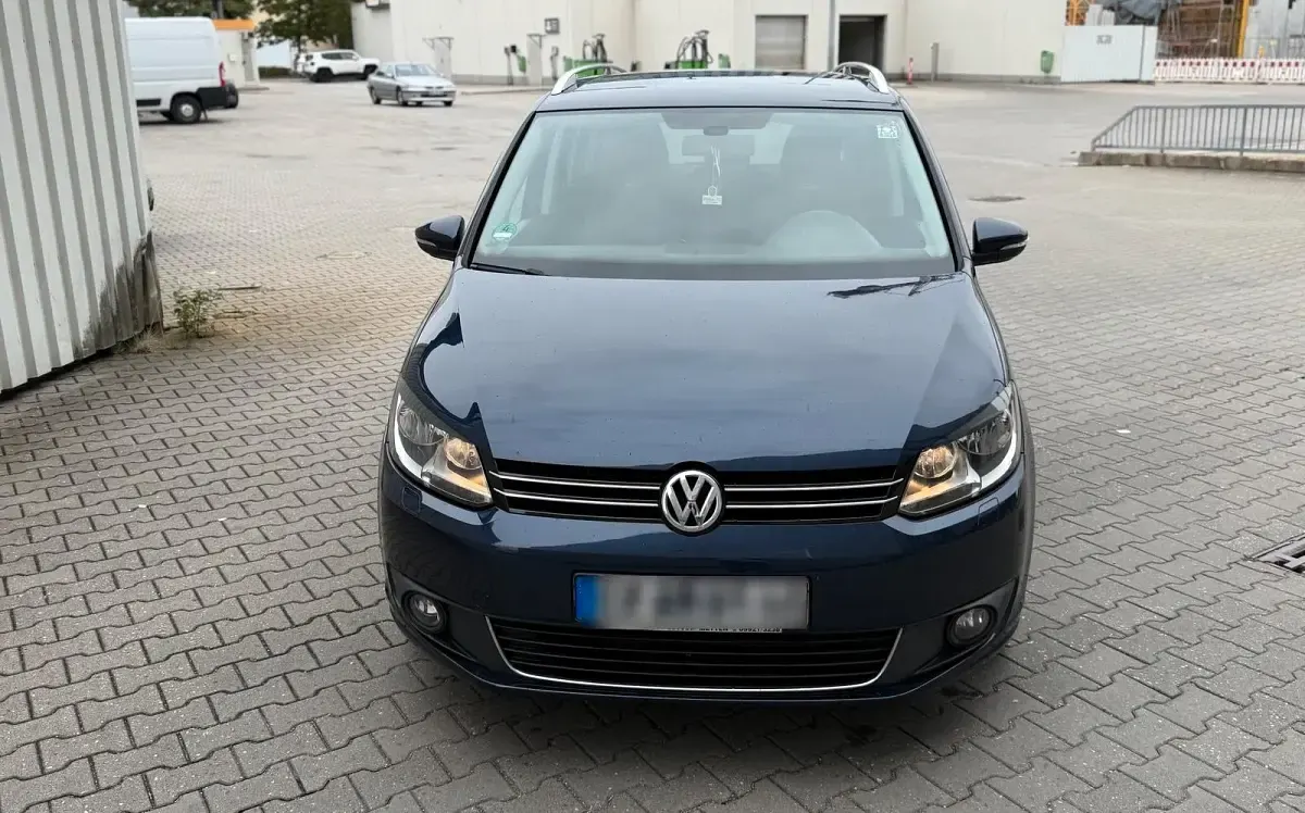 Używany VW Touran 105 KM (77 kW) 2011 Niebieski Minivan