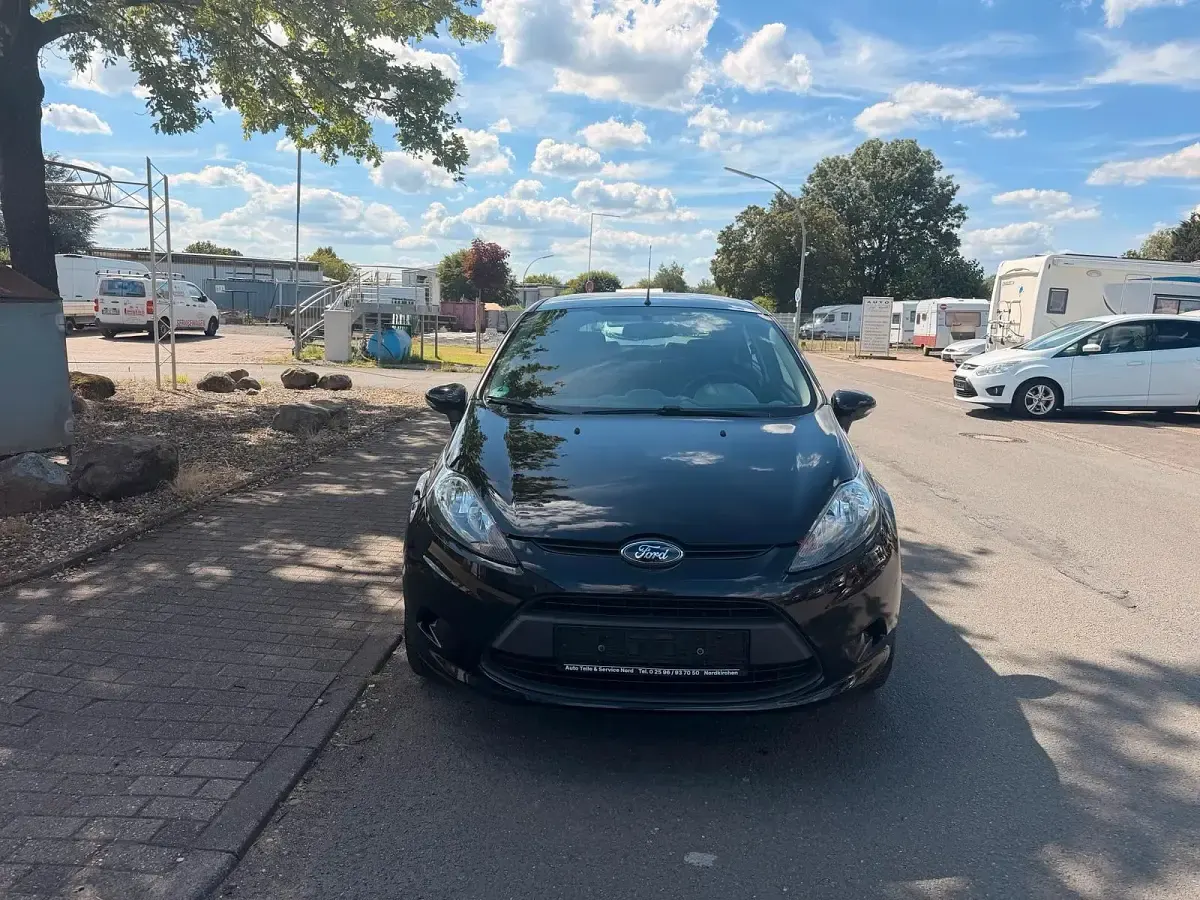 Gebraucht Ford Fiesta Titanium 60 PS (44 kW) 2011 Schwarz Kleinwagen