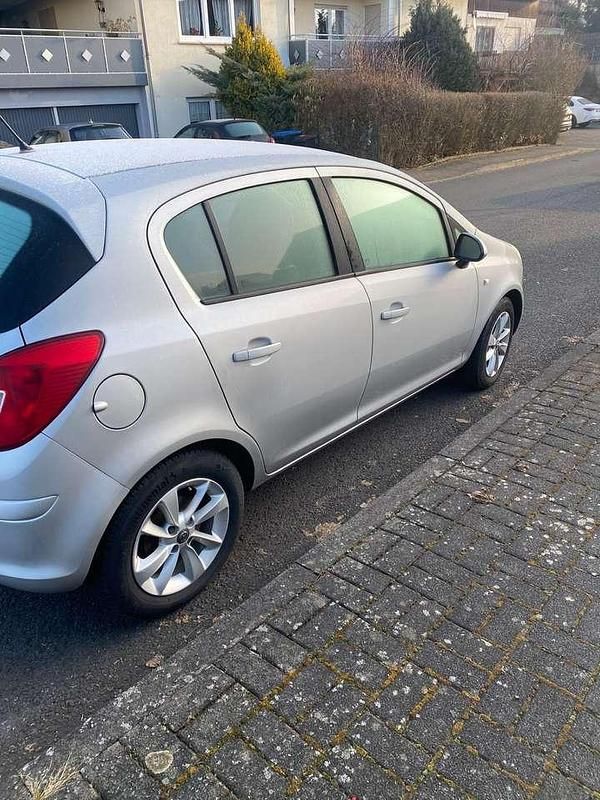 Gebraucht Opel Corsa 69 PS (50 kW) 2014 Silber Kleinwagen