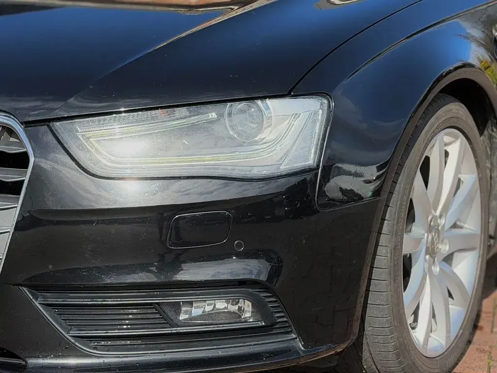 Używany Audi A4 Ambition 143 KM (105 kW) 2013 Czarny Kombi