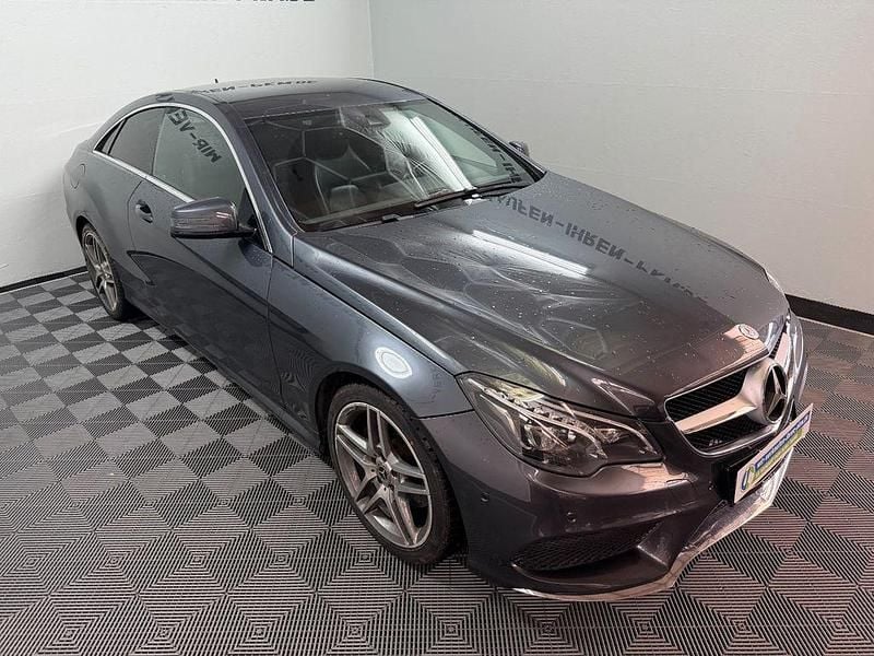 Grau Gebraucht 2014 Mercedes E200 AMG line Coupé | 10.000 € - Bild 1/4