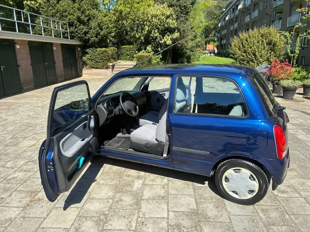 Gebraucht Daihatsu Cuore 56 PS (41 kW) 1999 Blau Kleinwagen