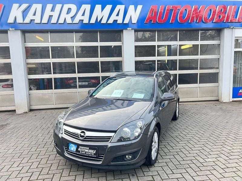 Grau Gebraucht 2010 Opel Astra Innovation Kombi | 4.399 € (Guter Preis) - Bild 1/4