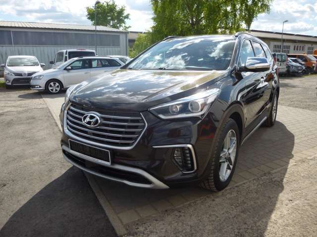 Tan brown / mic Gebraucht 2016 Hyundai Grand Santa Fe Premium SUV | 18.100 € (Guter Preis) - Bild 1/4