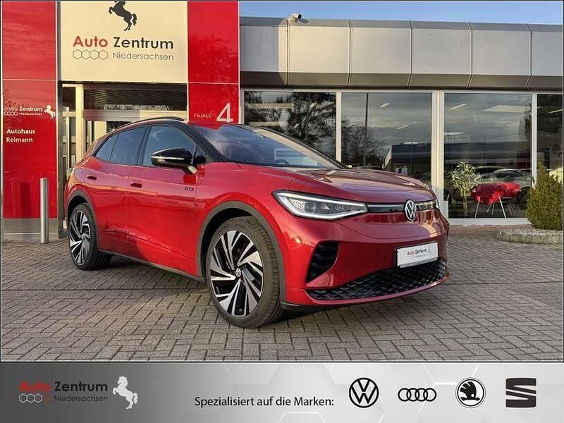 Kings red metallic Gebraucht 2025 VW ID.4 GTX SUV | 43.970 € (Guter Preis) - Bild 1/4