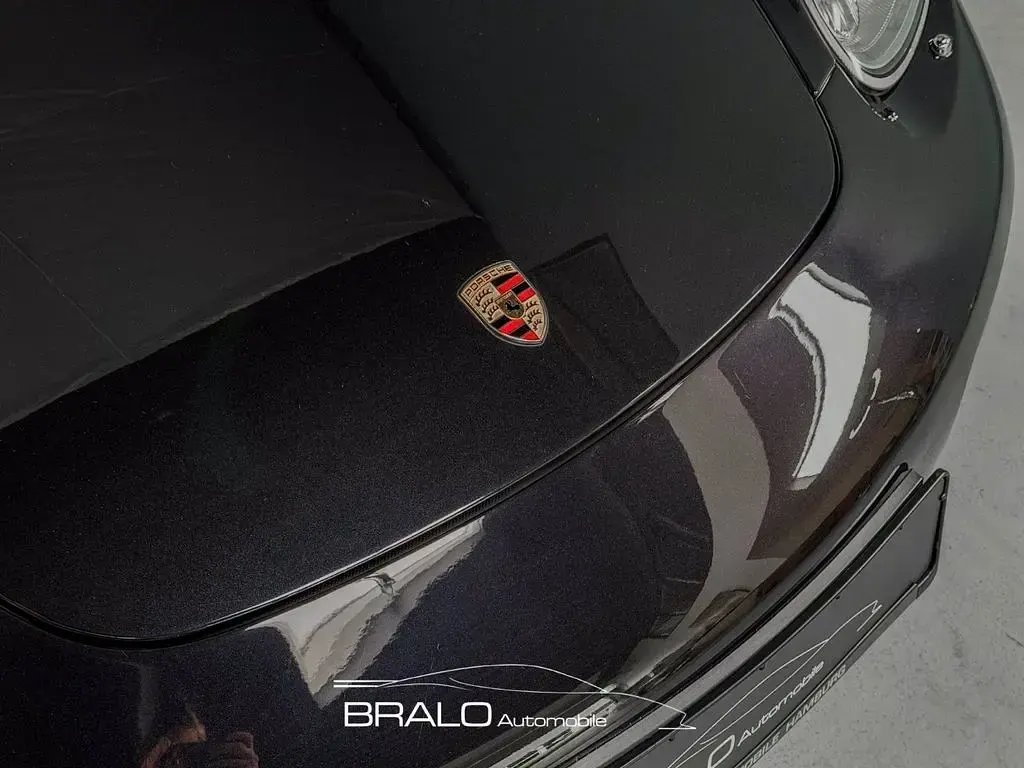 Gebraucht Porsche Boxster 239 PS (175 kW) 2005 Tiefschwarzmet. Cabrio