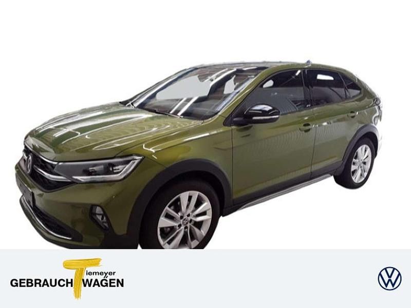 Grün Gebraucht 2024 VW Taigo Move SUV | 26.740 € (Fairer Preis) - Bild 1/4