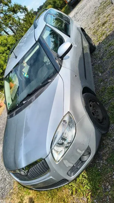Gebraucht Skoda Roomster 69 PS (50 kW) 2010 Silber Van / Kleinbus