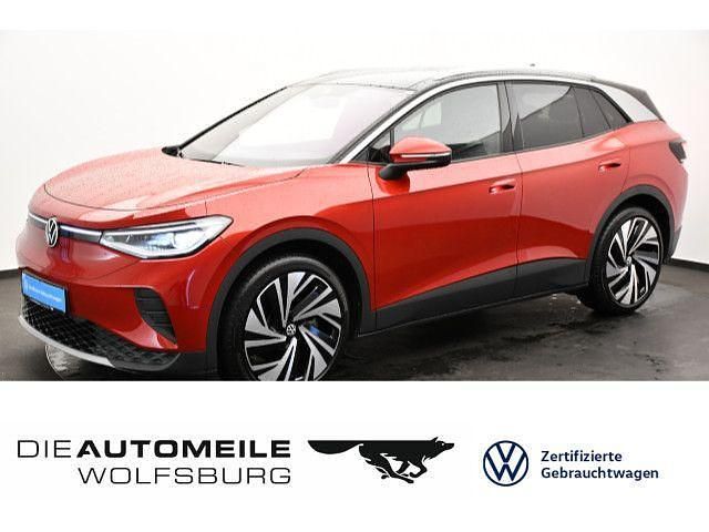 Kings red metallic (metallic) Gebraucht 2024 VW ID.4 Pro SUV | 42.990 € (Fairer Preis) - Bild 1/4