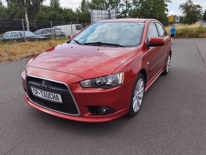 Rot Gebraucht 2009 Mitsubishi Lancer Sportback Inform Limousine | 5.490 € - Bild 1/4