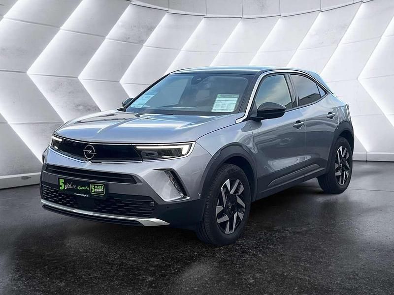 Gebraucht Opel Mokka Elegance 131 PS (96 kW) 2023 Kontrast grau/quarz silber SUV