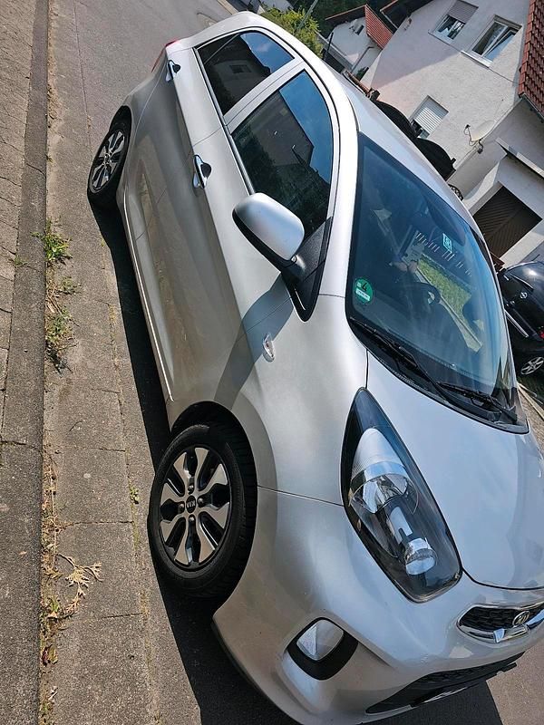 Silber Gebraucht 2015 Kia Picanto DREAM-TEAM Edition Kleinwagen | 6.850 € (Guter Preis) - Bild 1/4