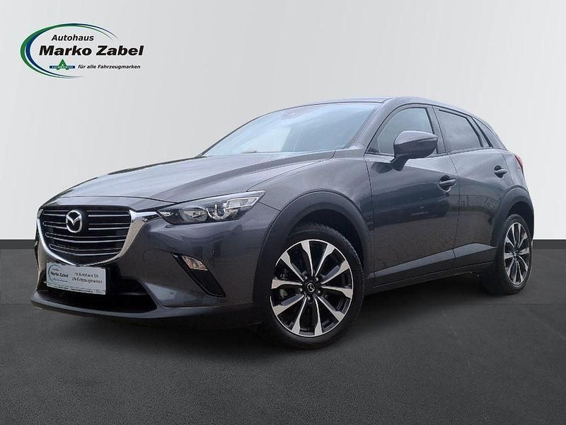 Machine grey Gebraucht 2021 Mazda CX-3 Ad'Vantage SUV | 19.990 € (Fairer Preis) - Bild 1/4