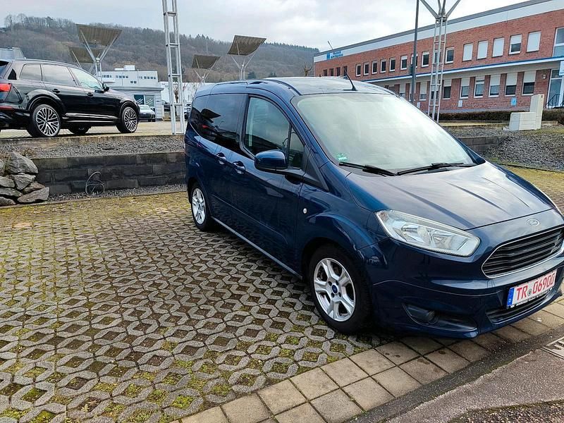 Gebraucht Ford Tourneo Courier 125 PS (91 kW) 2015 Blau Van / Kleinbus
