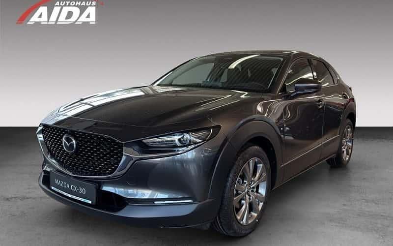 Machine gray Neu 2025 Mazda CX-30 Exclusive-Line SUV | 31.650 € - Bild 1/4