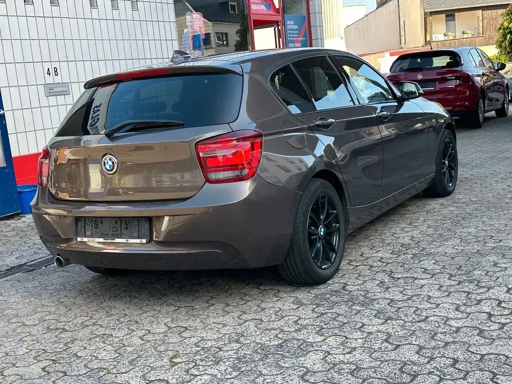Gebraucht BMW 118 143 PS (105 kW) 2014 Braun Kleinwagen