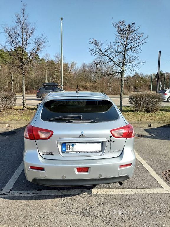 Second-hand Mitsubishi Lancer 117 CP (86 kW) 2011 Gri Berlinǎ