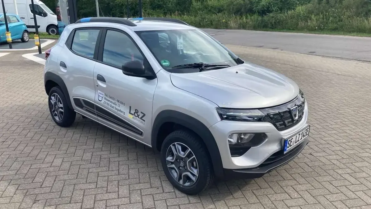 Gebraucht Dacia Spring Comfort 33 kW (45 PS) 2021 Silbergrau metallic Kleinwagen
