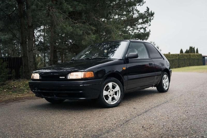 Schwarz Gebraucht 1991 Mazda 323 Limousine | 3.500 € - Bild 1/4