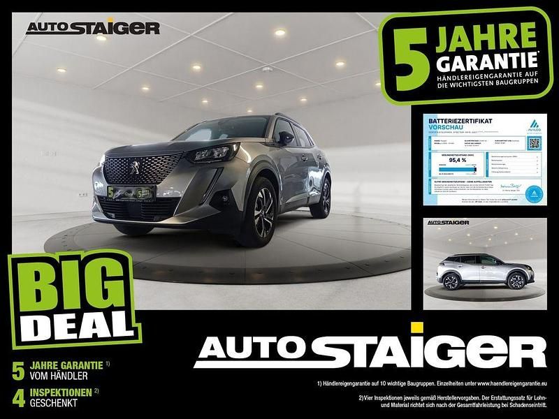 Lack grau artense/typ aussenverklei Gebraucht 2022 Peugeot e-2008 Allure SUV | 18.399 € (Guter Preis) - Bild 1/4