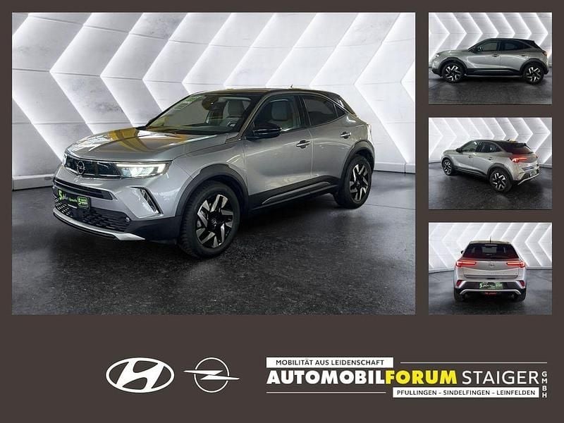 Gebraucht Opel Mokka-e Elegance 100 kW (136 PS) 2022 Kontrast grau/quarz silber SUV