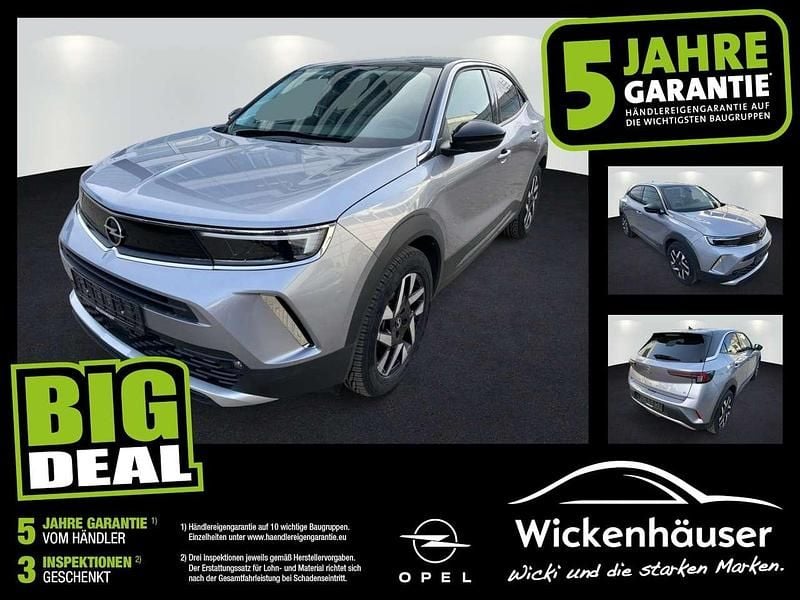 Kontrast grau/quarz silber (metallic) Gebraucht 2022 Opel Mokka-e Elegance SUV | 15.990 € (Guter Preis) - Bild 1/4