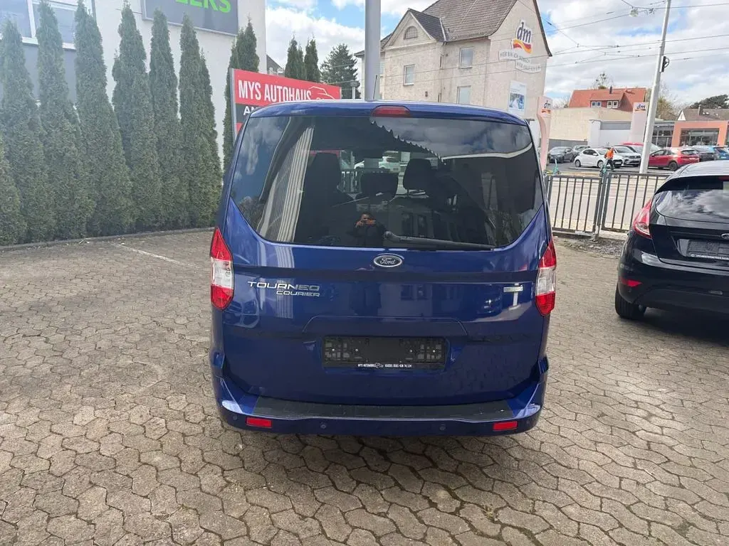 Gebraucht Ford Tourneo Courier Trend 101 PS (74 kW) 2015 Blau Van / Kleinbus