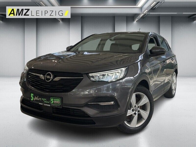 Mondstein grau/e:vulkan grau Gebraucht 2021 Opel Grandland X Edition SUV | 19.895 € (Superpreis) - Bild 1/4