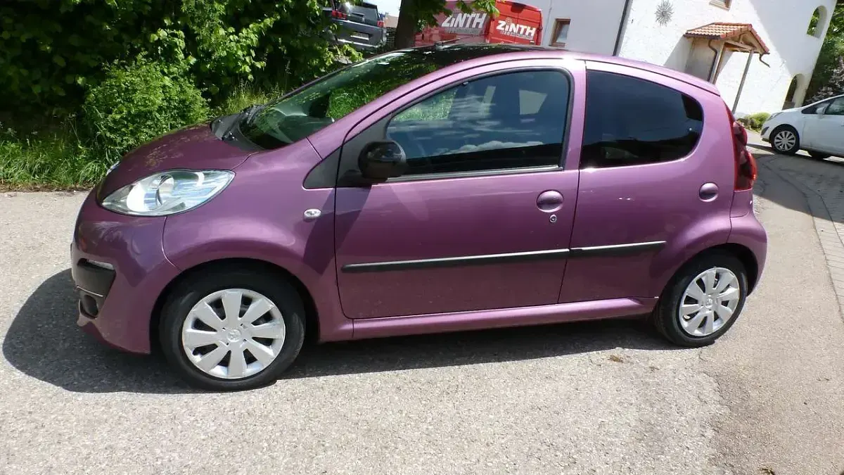 Gebraucht Peugeot 107 Active 68 PS (50 kW) 2014 Violett metallic Kleinwagen