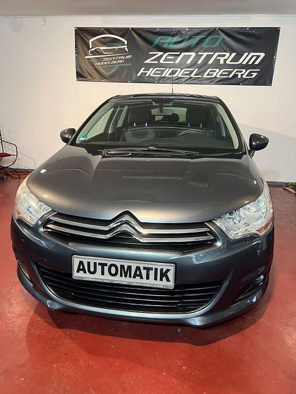 Grau Gebraucht 2012 Citroën C4 Tendance Limousine | 6.680 € (Fairer Preis) - Bild 1/4