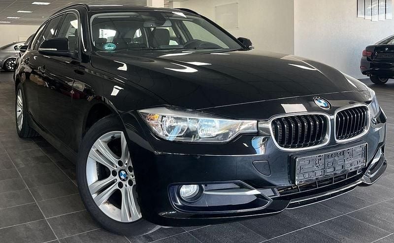 Schwarz 2 Gebraucht 2013 BMW 318 Sport Line Kombi | 7.990 € (Guter Preis) - Bild 1/4