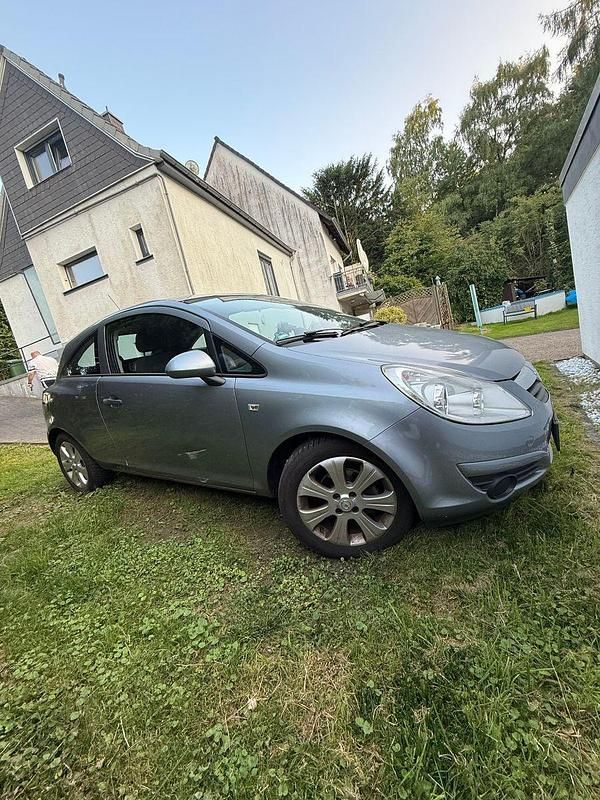Grau Gebraucht 2010 Opel Corsa Selection Limousine | 3.499 € (Fairer Preis) - Bild 1/3
