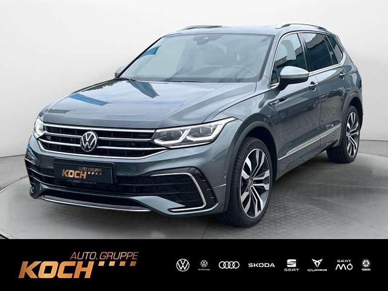 Platinum grey metallic Gebraucht 2024 VW Tiguan Allspace R-line SUV | 48.690 € - Bild 1/4