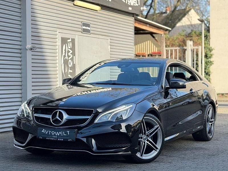 Schwarz Gebraucht 2015 Mercedes E250 AMG Coupé | 22.700 € (Superpreis) - Bild 1/4