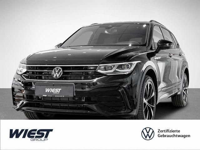 Deep black perleffekt Gebraucht 2024 VW Tiguan Allspace R-line SUV | 54.550 € - Bild 1/4