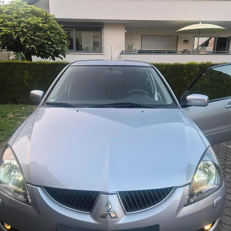 Grau Gebraucht 2005 Mitsubishi Lancer Kombi | 4.999 € (Teuer) - Bild 1/4