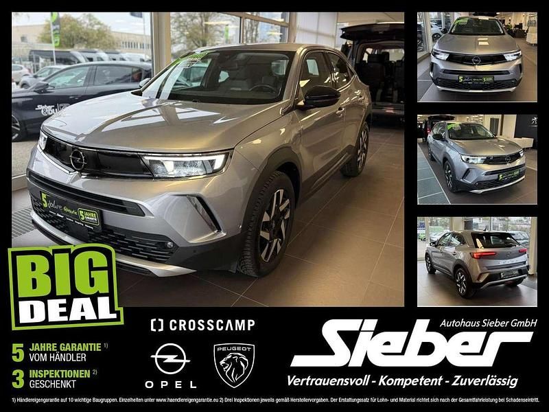 Gebraucht Opel Mokka Elegance 101 PS (74 kW) 2023 Kontrast grau/quarz silber SUV