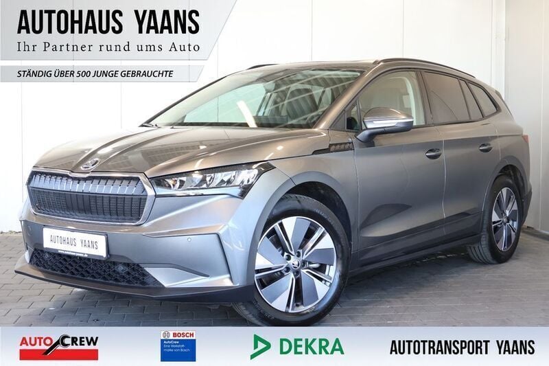 Grau Gebraucht 2024 Skoda Enyaq iV Loft SUV | 34.289 € (Fairer Preis) - Bild 1/4