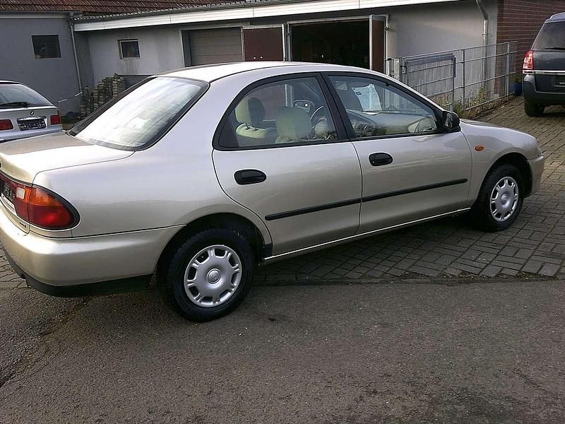 Gebraucht Mazda 323S 73 PS (53 kW) 1994 Bronze Limousine