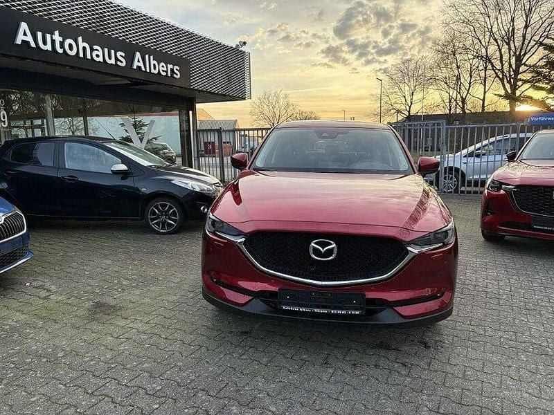 Grau metallic Gebraucht 2018 Mazda CX-5 Exclusive-Line SUV | 20.799 € (Fairer Preis) - Bild 1/4