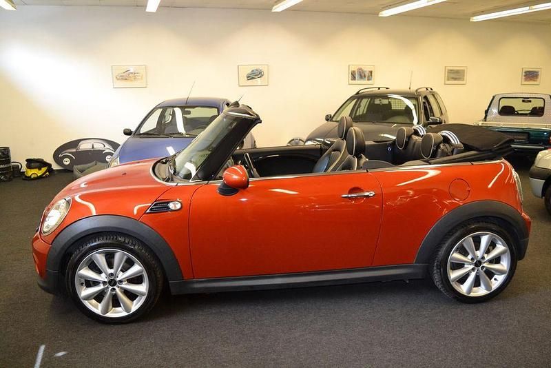 Second-hand Mini Cooper Cabriolet 122 CP (89 kW) 2011 Portocaliu Cabrio