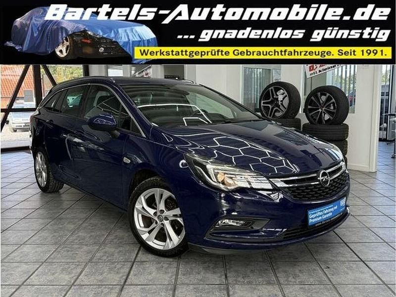 Royal blau (s2) Gebraucht 2016 Opel Astra Dynamic Kombi | 8.880 € (Guter Preis) - Bild 1/4